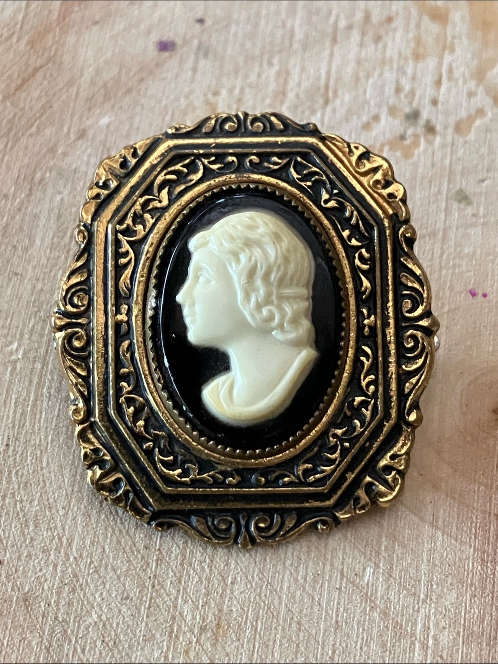 Antique Gold Tone Cameo Brooch with Bone Color Profile on Black